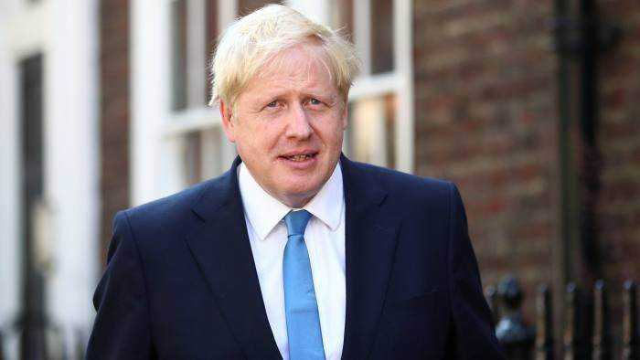 Boris Johnson announces that non-essential shops will all shut down  Photograph
