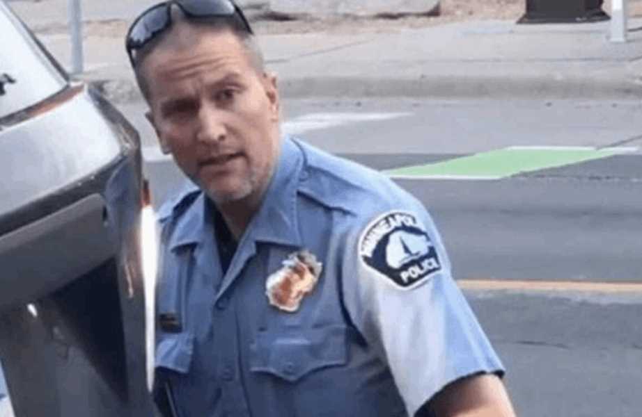 Police officer filmed kneeling on George Floyd's neck charged with murder and three officers fired Photograph