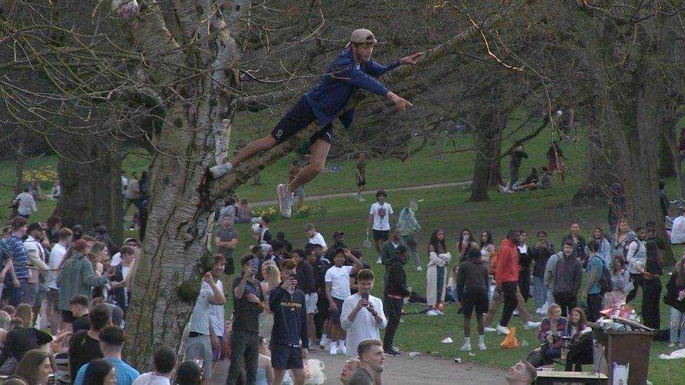 Police have warned people to stick to coronavirus rules after large crowds were seen in a city park on the day restrictions eased Photograph
